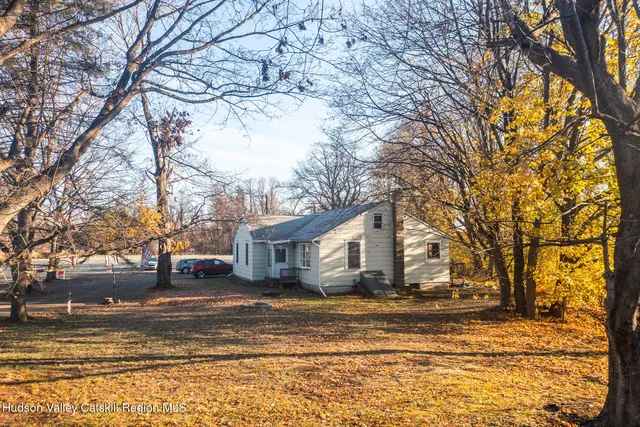 a view of a terrace with wooden floor and mountain view
