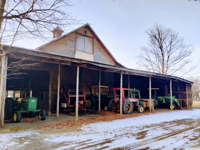 a view of a chairs in front of retail shop