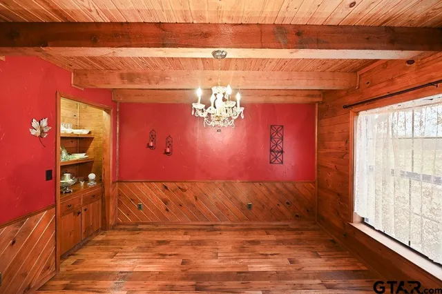 a view of a livingroom with furniture and a couch