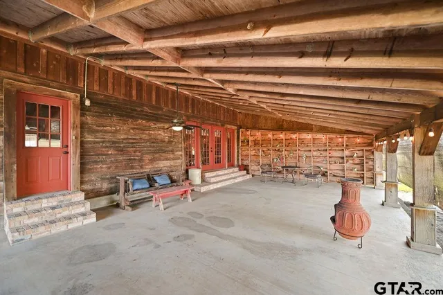 a view of a porch with furniture