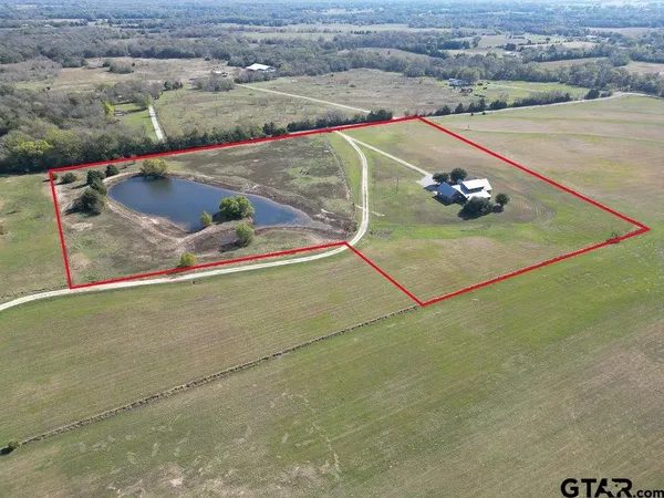 a view of a room with a floor to ceiling window