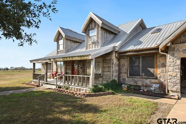 a view of a house with a patio