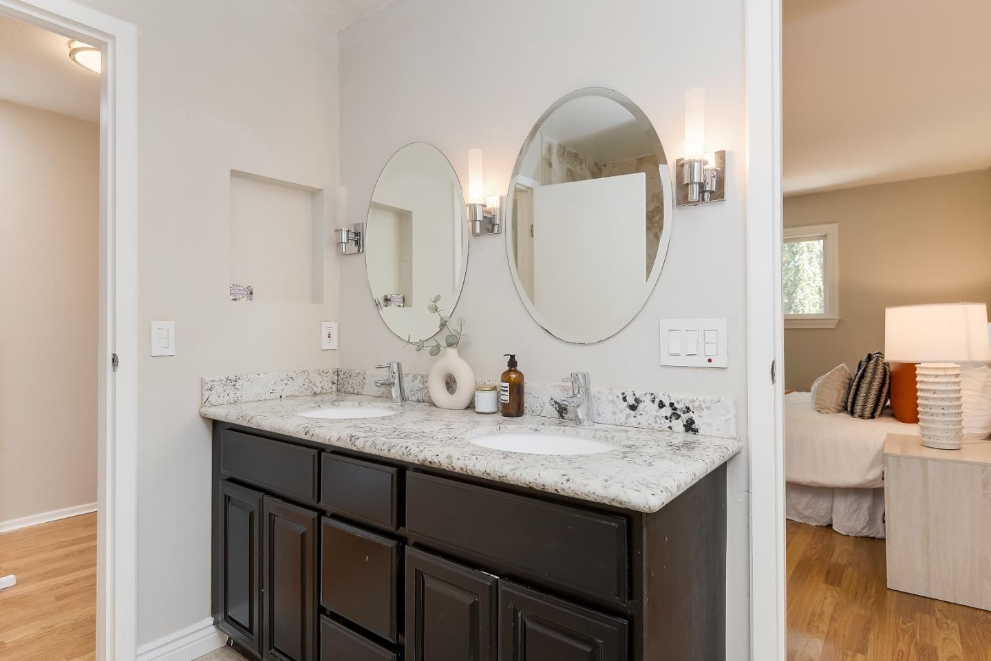 1101 Reed Avenue, Unit B Sunnyvale, CA 94086 - Photo 15 of 19 a en suite bathroom with a double vanity sink and a mirror