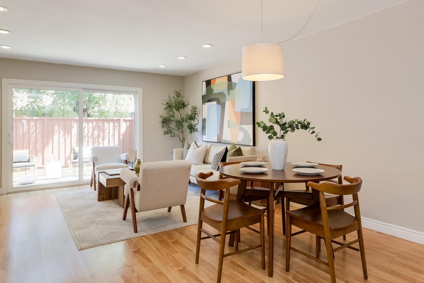 1101 Reed Avenue, Unit B Sunnyvale, CA 94086 - Photo 5 of 19 a living room with furniture and a large window