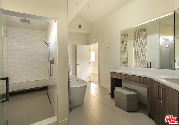a white bath tub sitting in a bathroom