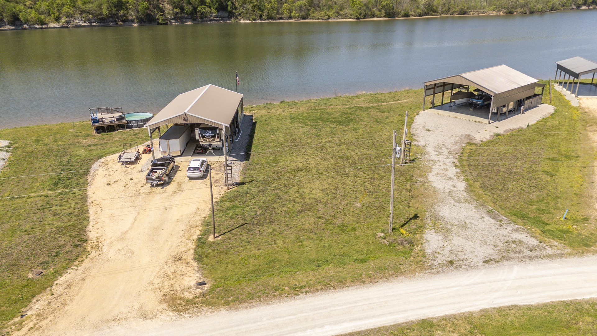 2271 Hardin Bottom River Road Clifton, TN 38425 - Photo 11 of 31 a view of a lake with houses