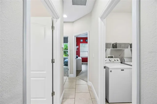 a front view of house with yard and outdoor seating