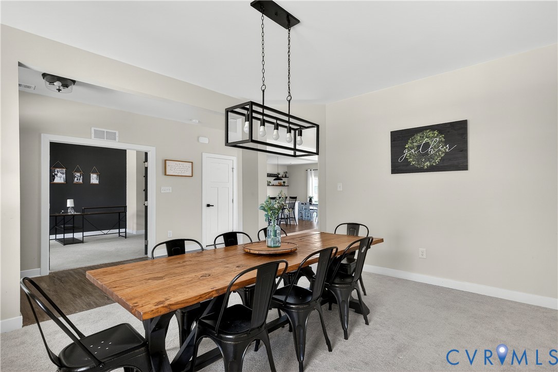 1618 Almer Lane Chester, VA 23836 - Photo 11 of 59 a view of a dining room with furniture