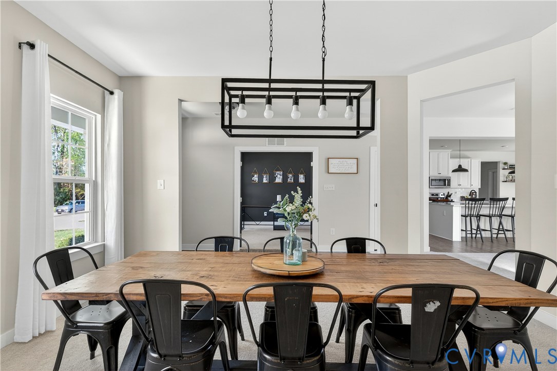1618 Almer Lane Chester, VA 23836 - Photo 12 of 59 a view of a dining room with furniture and window