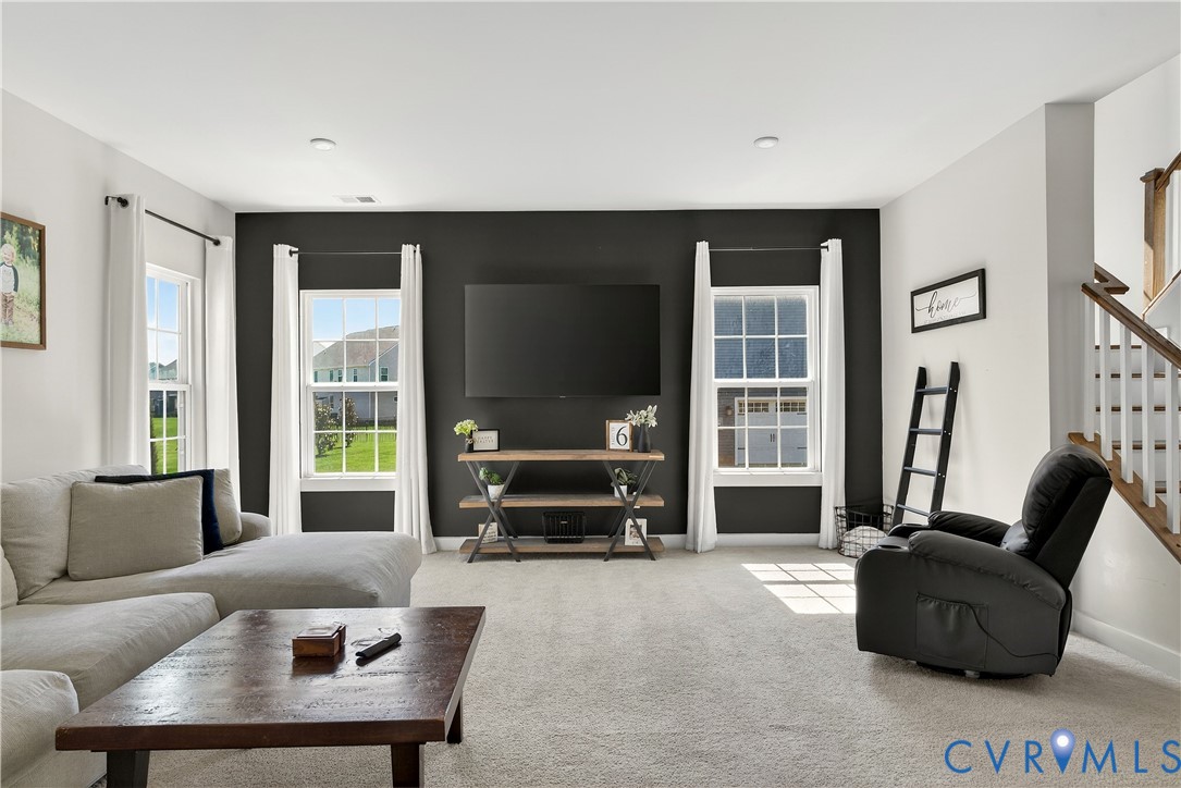1618 Almer Lane Chester, VA 23836 - Photo 15 of 59 a living room with furniture and a large window