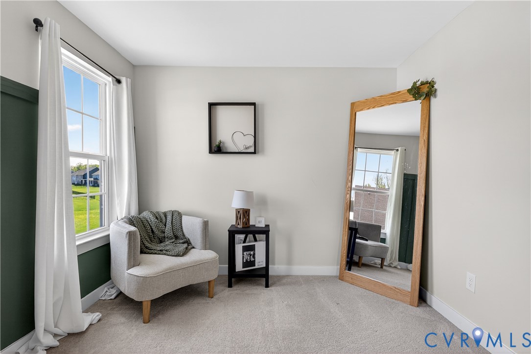 1618 Almer Lane Chester, VA 23836 - Photo 41 of 59 a living room with furniture and a potted plant