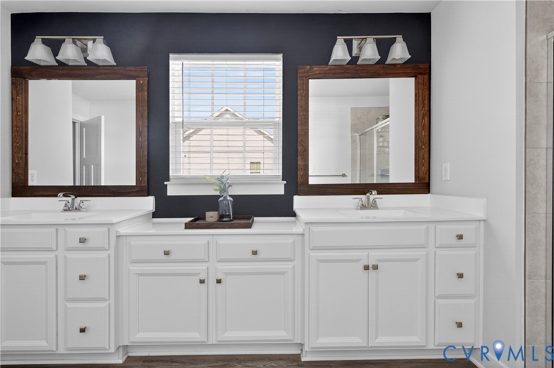 1618 Almer Lane Chester, VA 23836 - Photo 44 of 59 a bathroom with a sink vanity and mirror