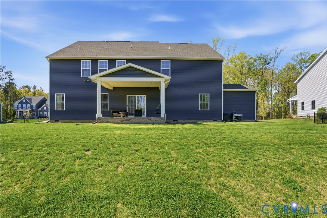 1618 Almer Lane Chester, VA 23836 - Photo 52 of 59 a front view of a house with a yard