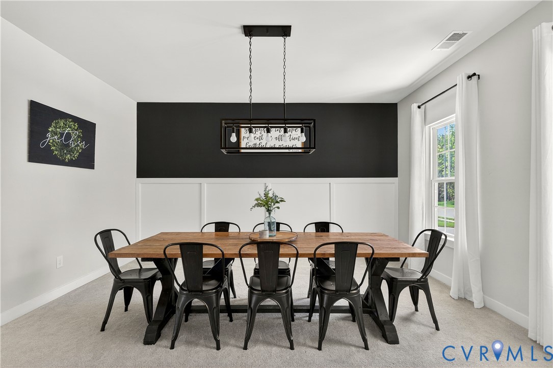 1618 Almer Lane Chester, VA 23836 - Photo 9 of 59 a view of a dining room with furniture and chandelier