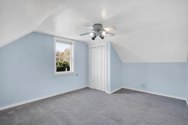 a view of a big room with carpet