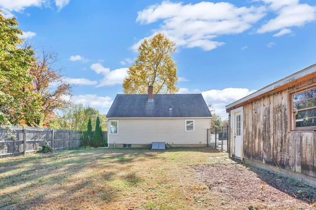 a house view with garden space
