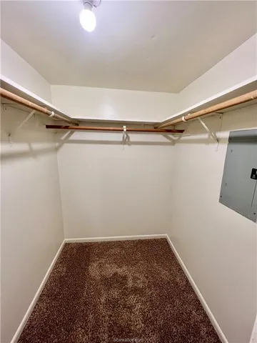 a view of a room with racks on the wall