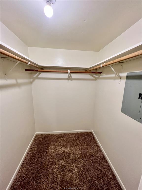 711 Vassar Court, Unit B College Station, TX 77840 - Photo 13 of 23 a view of a room with racks on the wall