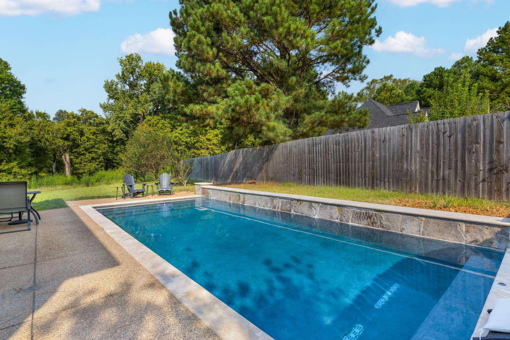 6525 North Watkins Road Millington, TN 38053 - Photo 29 of 35 a view of a swimming pool with a patio and a yard
