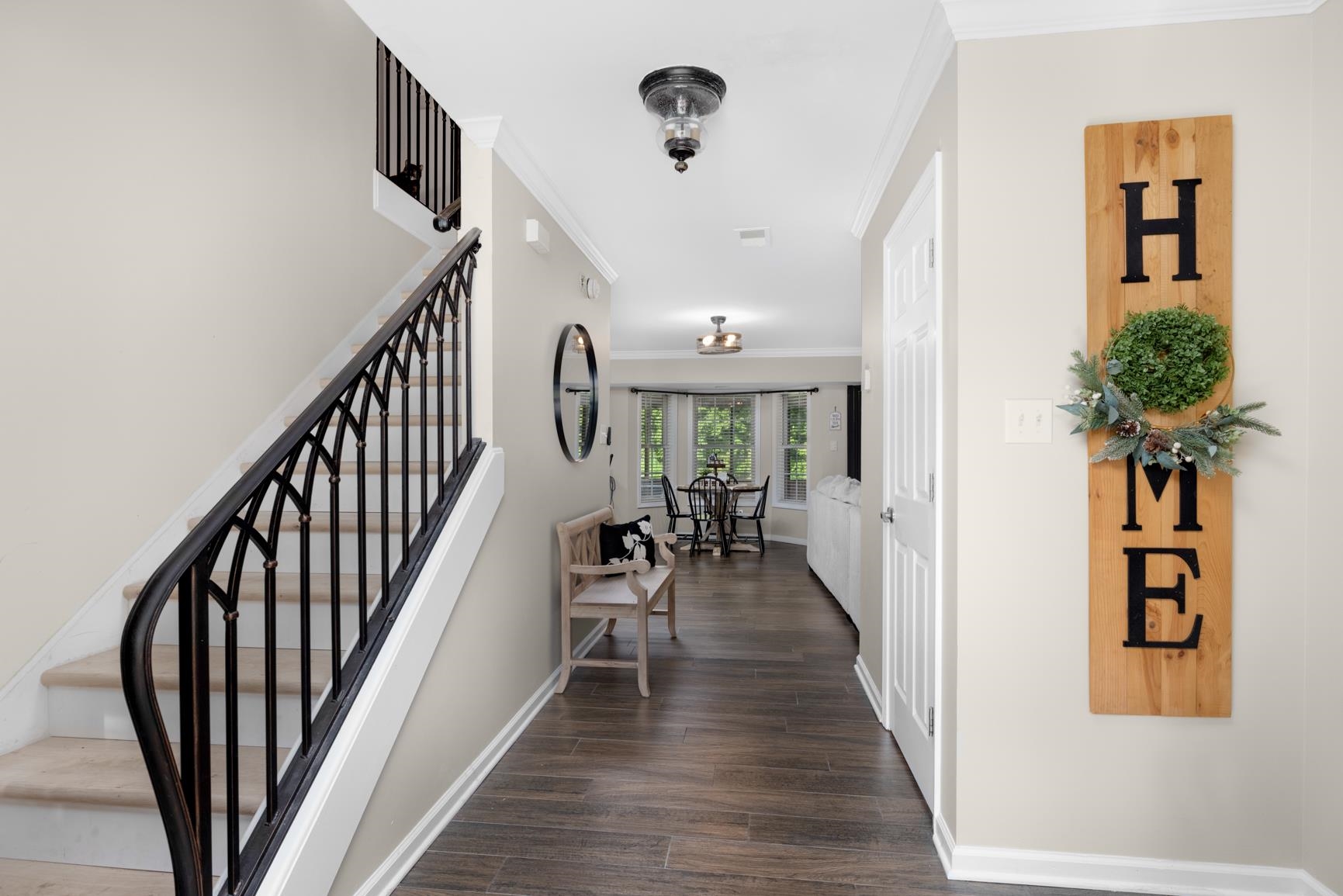 6525 North Watkins Road Millington, TN 38053 - Photo 4 of 35 a view of a hallway with wooden floor and stairs