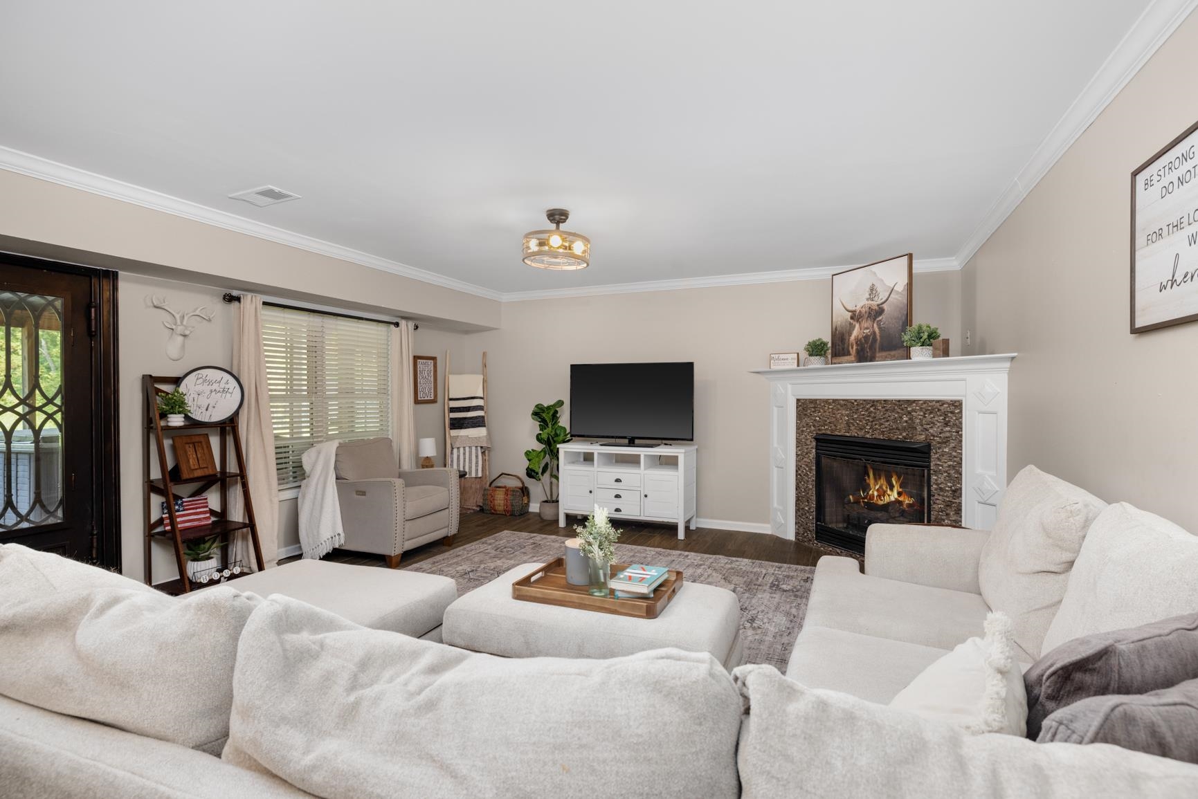 6525 North Watkins Road Millington, TN 38053 - Photo 6 of 35 a living room with furniture and a fireplace