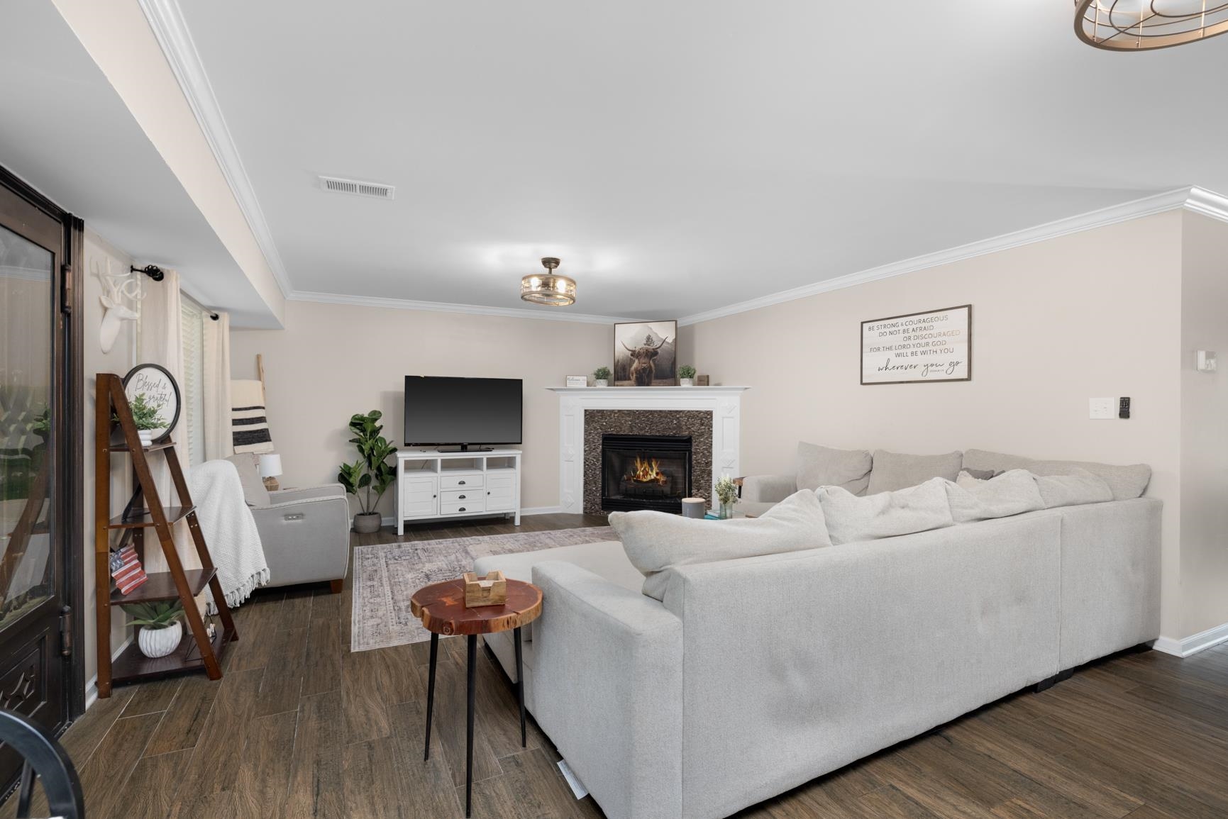 6525 North Watkins Road Millington, TN 38053 - Photo 8 of 35 a living room with furniture and a fireplace