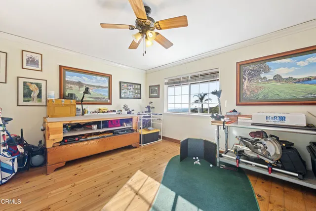 a room with furniture and a flat screen tv