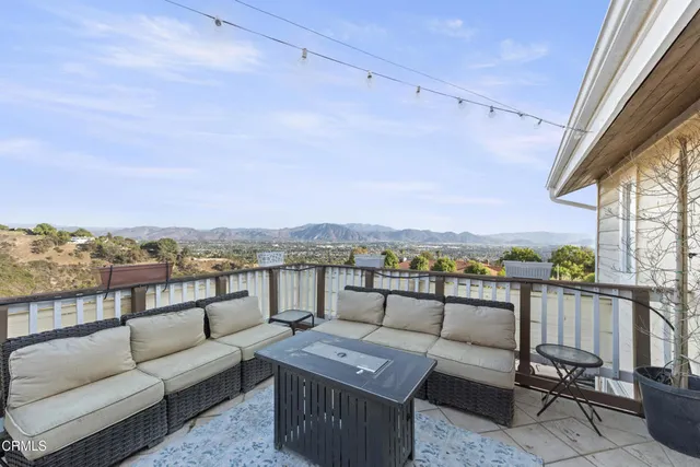 a view of a terrace with couches and a table
