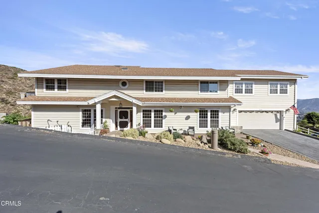 front view of a house with a street