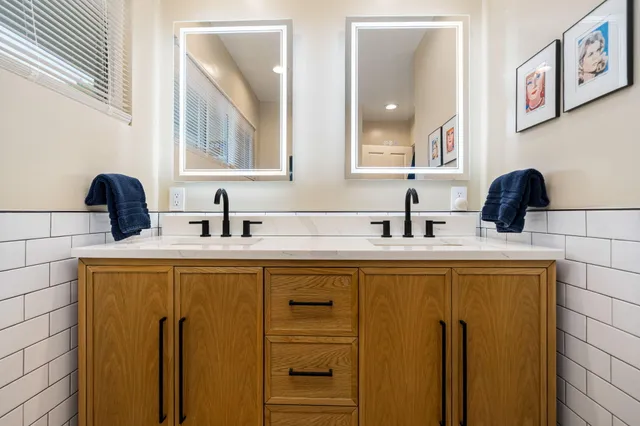 a view of a swimming pool with a table and chairs