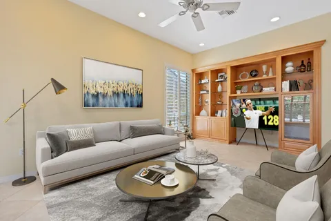 a living room with furniture and a table