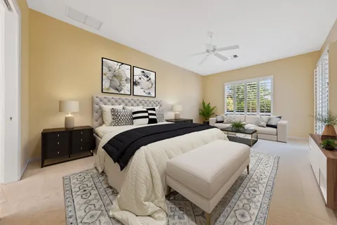 a bedroom with double bed and a window