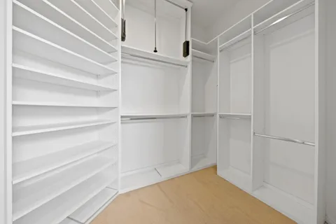 a view of an empty walk in closet