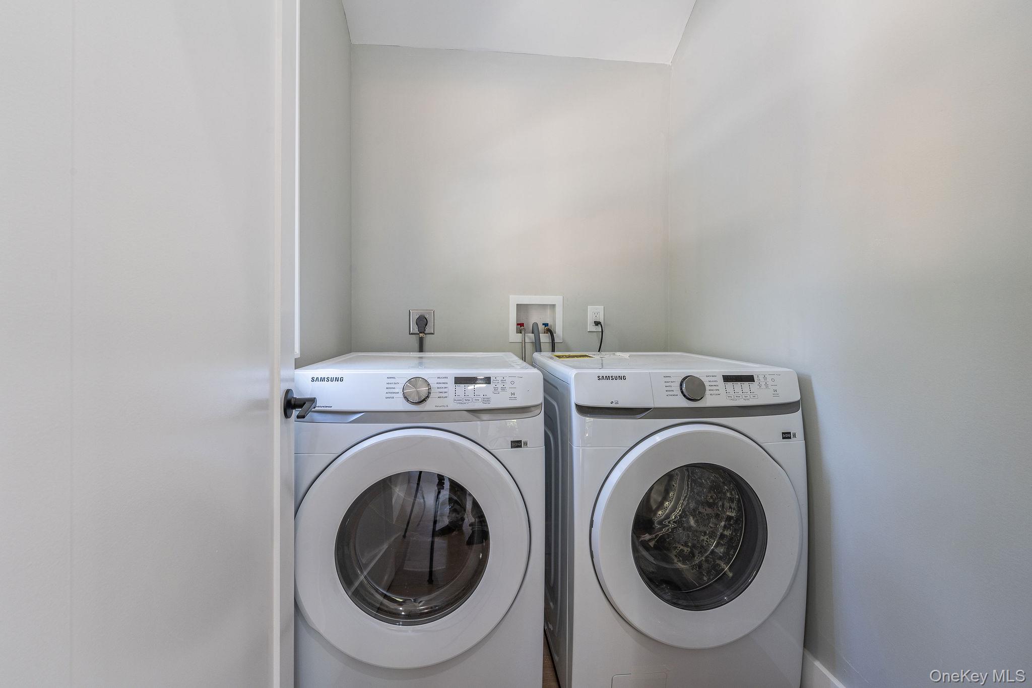 3420 Rocky Point Road East Marion, NY 11939 - Photo 22 of 34 Laundry area with separate washer and dryer