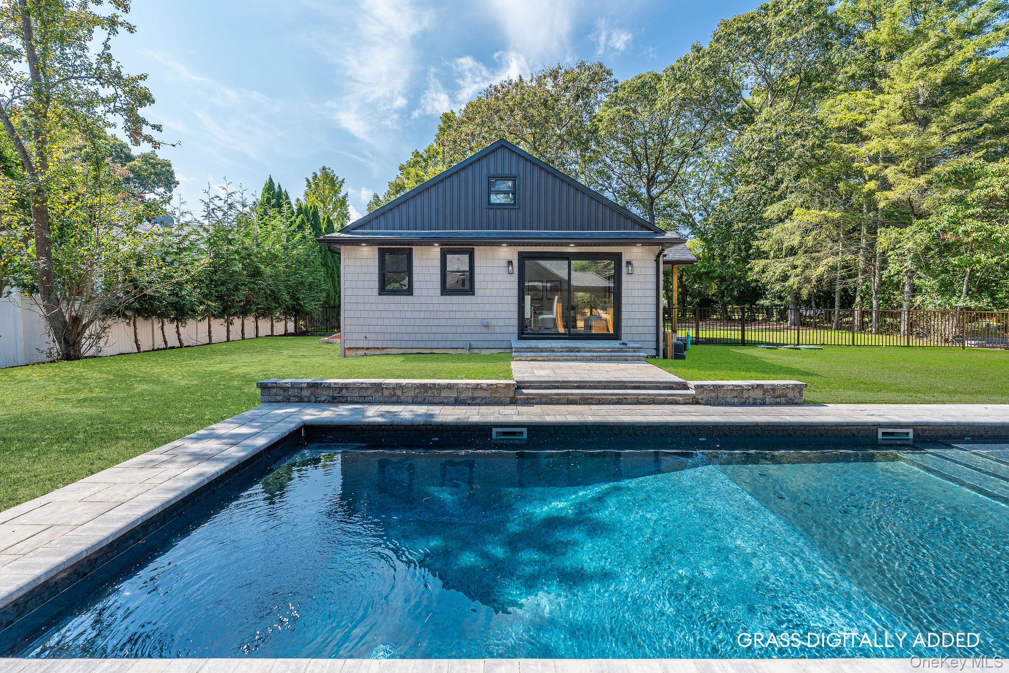 3420 Rocky Point Road East Marion, NY 11939 - Photo 29 of 34 View of pool with a fenced backyard and a patio area