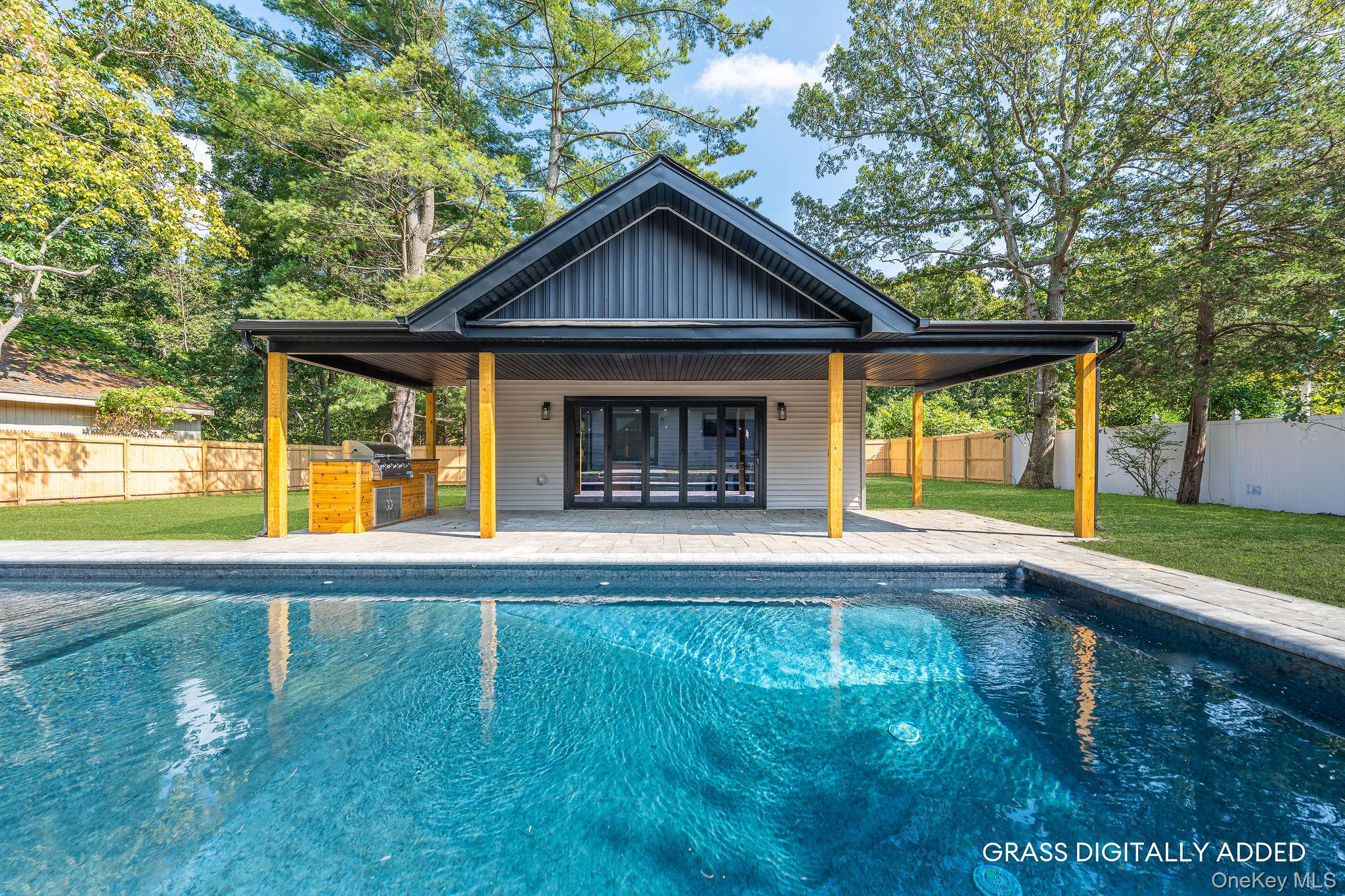 3420 Rocky Point Road East Marion, NY 11939 - Photo 4 of 34 View of pool with a fenced backyard, a patio, and area for grilling