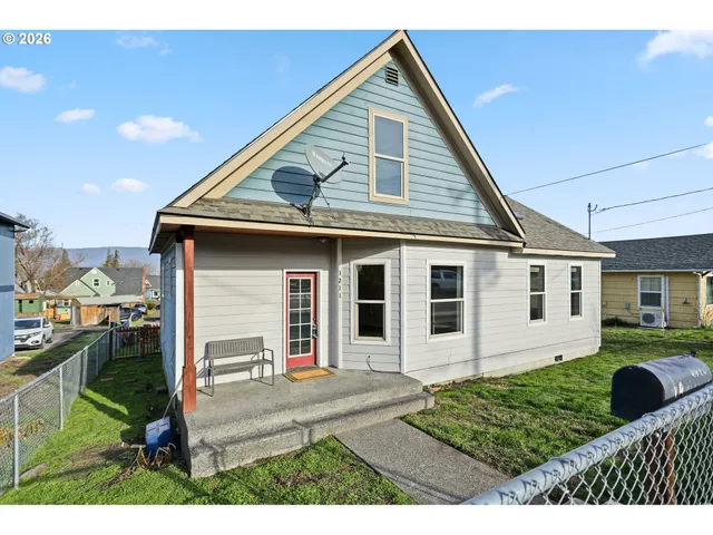 a view of a balcony with furniture