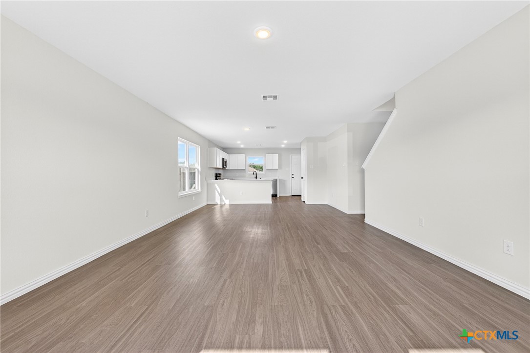 1007 Antelope Trail Temple, TX 76504 - Photo 6 of 29 View of family space from front of home into kitchen