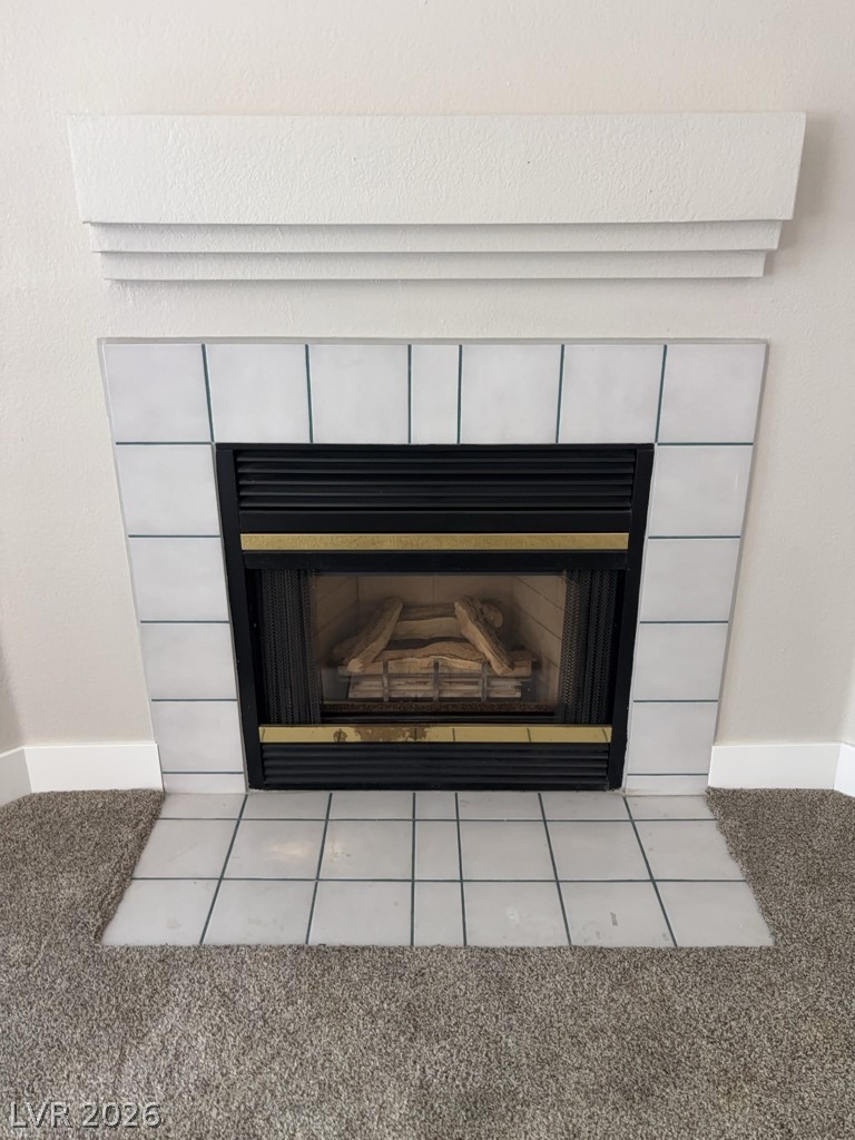 4810 Black Bear Road, Unit 201 Las Vegas, NV 89149 - Photo 2 of 9 Living room fireplace