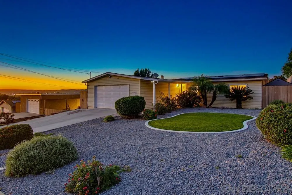 a view of a backyard with a garden