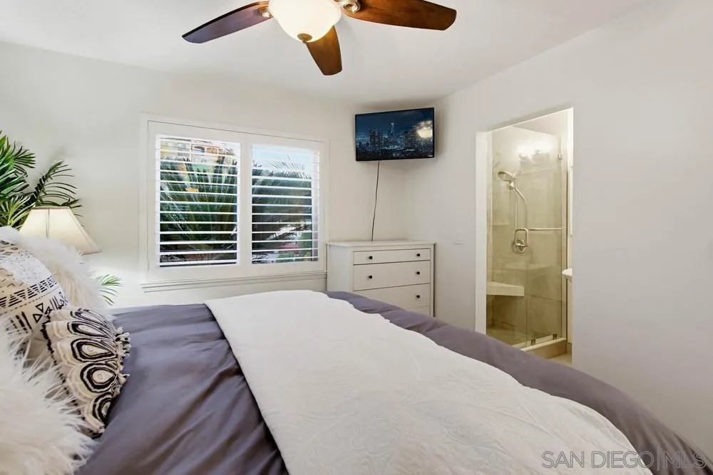 11038 Larkridge Street Santee, CA 92071 - Photo 16 of 44 a bedroom with a bed and a television