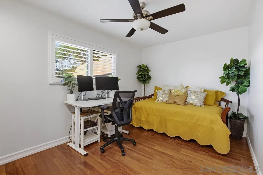 11038 Larkridge Street Santee, CA 92071 - Photo 21 of 44 a living room with furniture and a potted plant