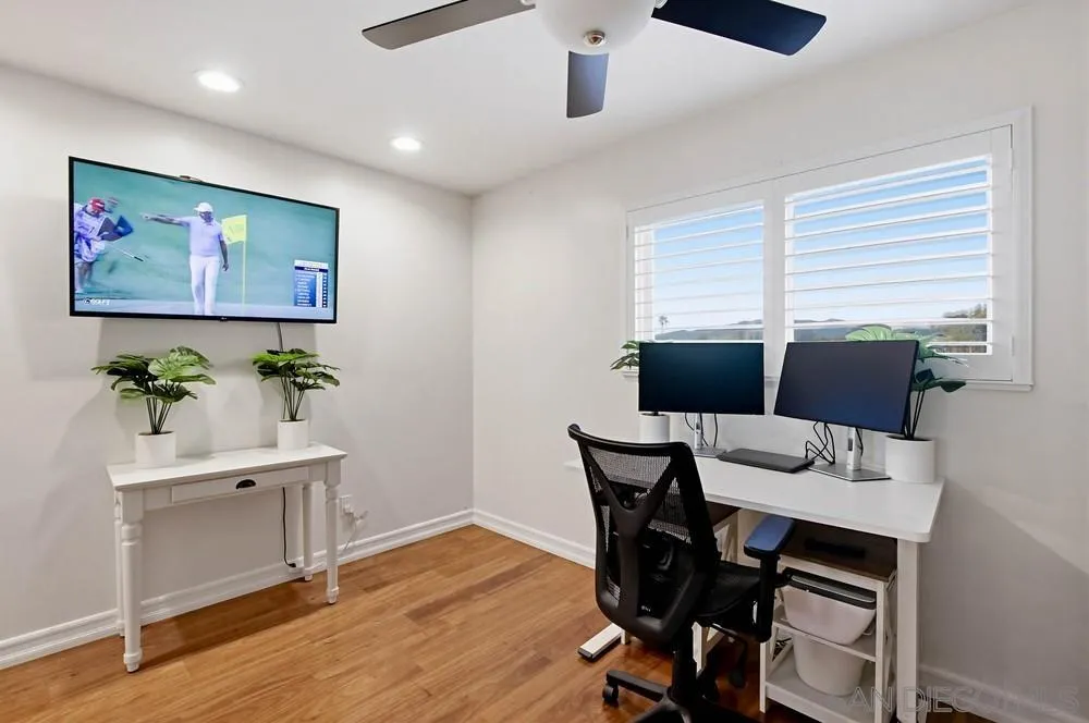 11038 Larkridge Street Santee, CA 92071 - Photo 22 of 44 a view of a dining room with furniture window and wooden floor
