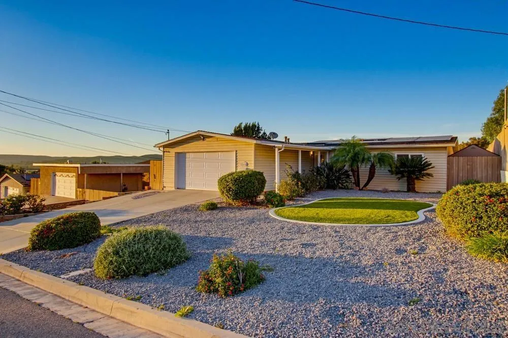 11038 Larkridge Street Santee, CA 92071 - Photo 23 of 44 a view of a house with backyard and swimming pool