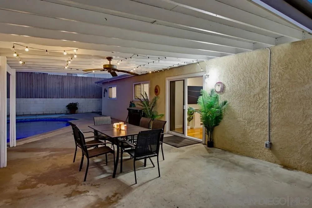 11038 Larkridge Street Santee, CA 92071 - Photo 25 of 44 a view of a table and chairs in patio