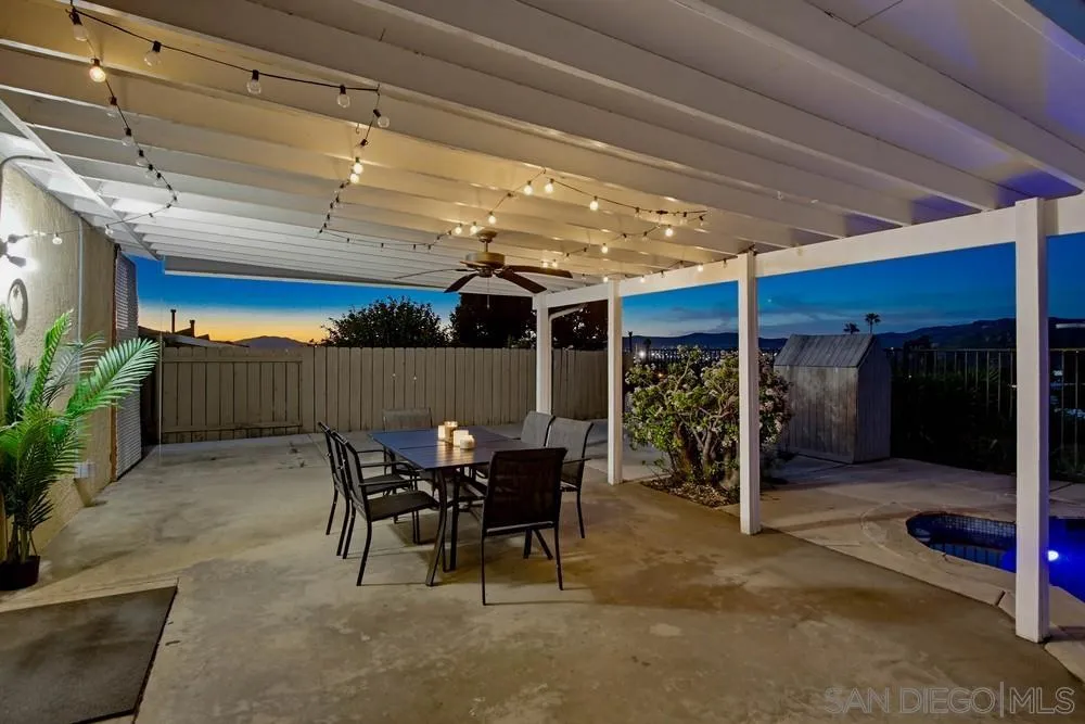 11038 Larkridge Street Santee, CA 92071 - Photo 31 of 44 a view of a patio with table and chairs