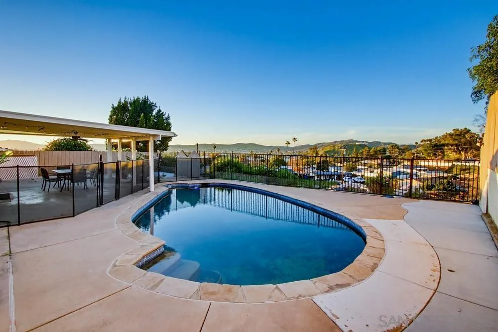 11038 Larkridge Street Santee, CA 92071 - Photo 36 of 44 a view of a swimming pool with an outdoor seating