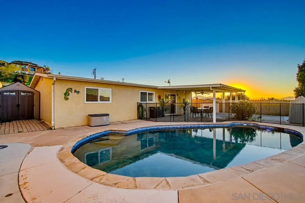 11038 Larkridge Street Santee, CA 92071 - Photo 39 of 44 a view of a swimming pool with a lounge chair