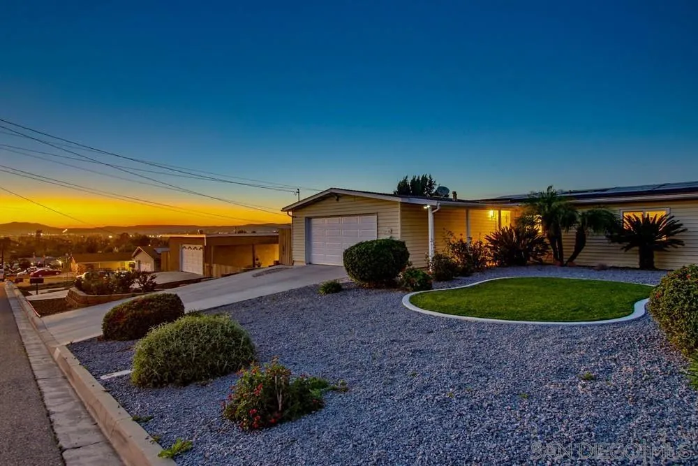 11038 Larkridge Street Santee, CA 92071 - Photo 4 of 44 a view of a backyard