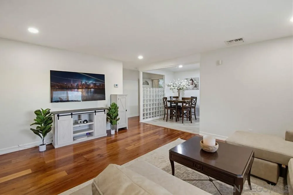 11038 Larkridge Street Santee, CA 92071 - Photo 7 of 44 a living room with furniture and a flat screen tv